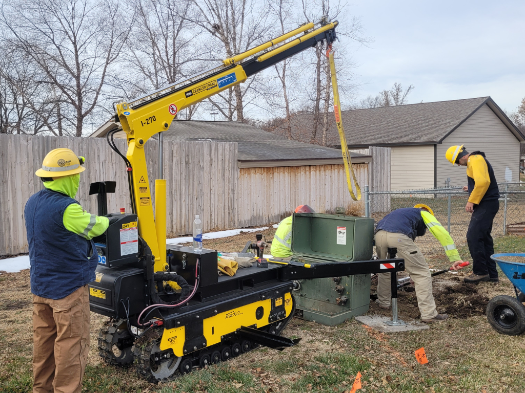 Mini-CRawler Crane installing a pad-mounted transformer