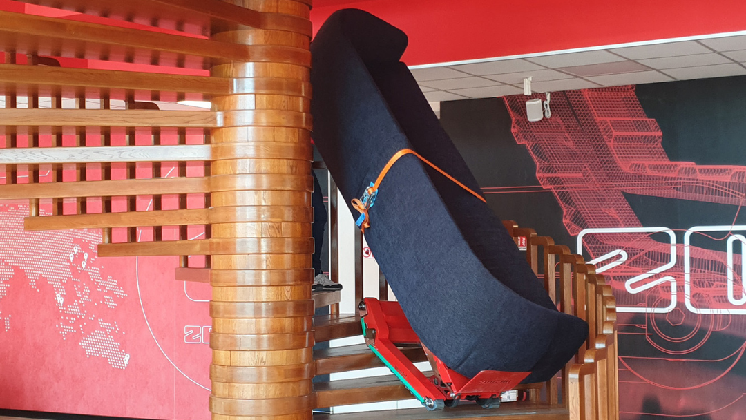 Stair climbing dolly moving a couch